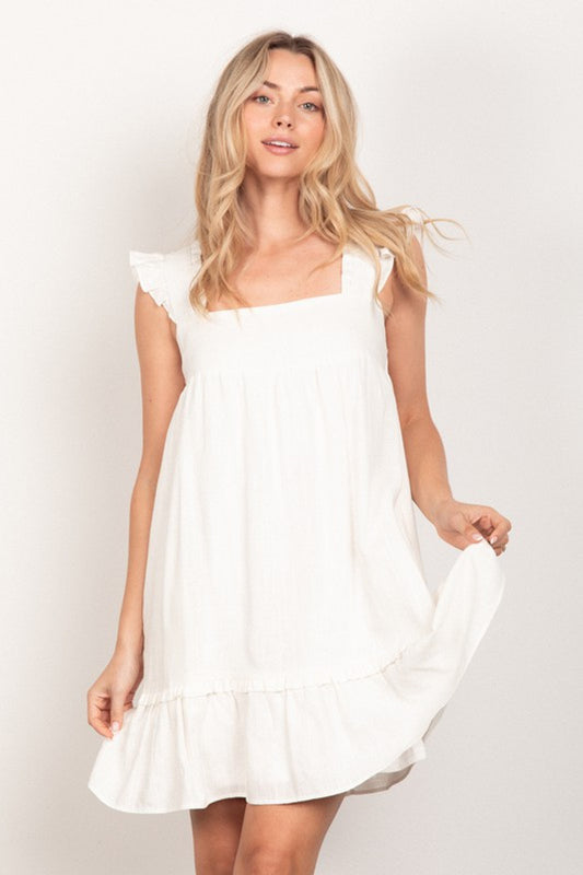 Solid White Dress with Ruffle Hem